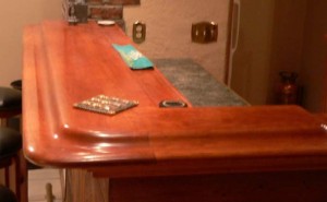 Solid Cherry bar top with hand carved elbow rest