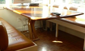 breakfast nook table installed.  the stripes are from the light coming through the windows