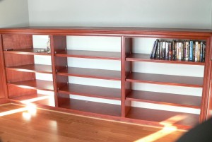 The smaller book case features 16 wide shelves